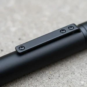 Close-up of a deep-carry pocket clip on a matte black edc fountain pen.